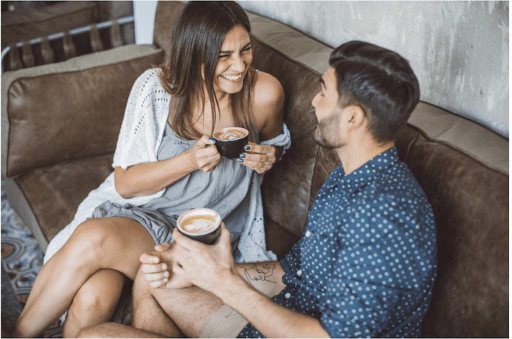 couple in coffee shop talking about money