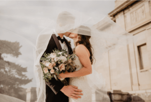 bride and groom celebrating wedding and building wealth 