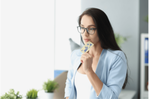 woman thinking about how to spend intentionally for a wedding and build wealth