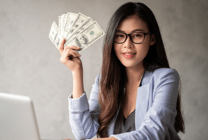 happy woman with money