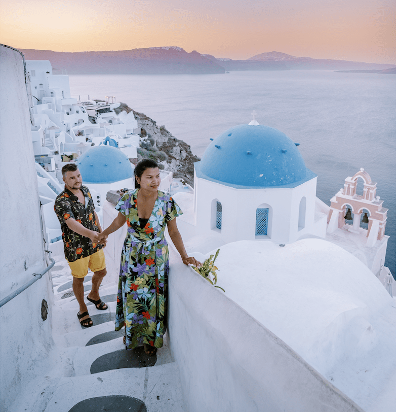 couple in greece for budget friendly honeymoon