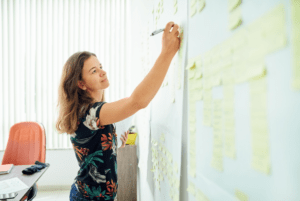 woman writing thoughts about money 