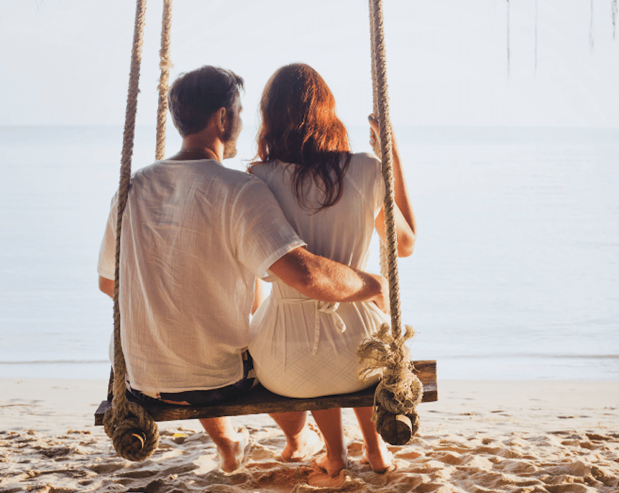 happy couple at the beach