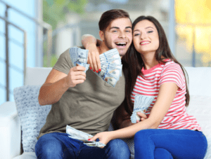 couple happy with money 