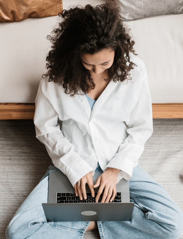 woman and couch blogging